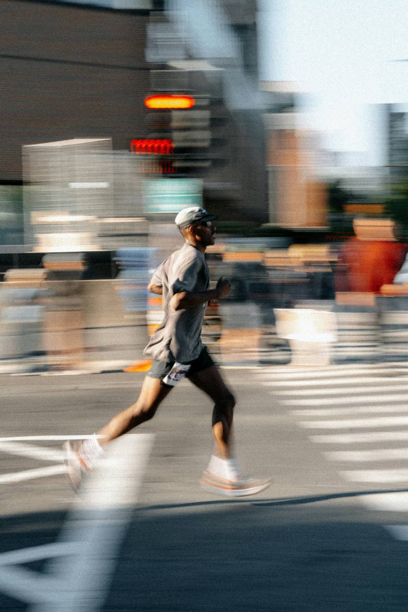 A runner caught mid-stride in a panning shot